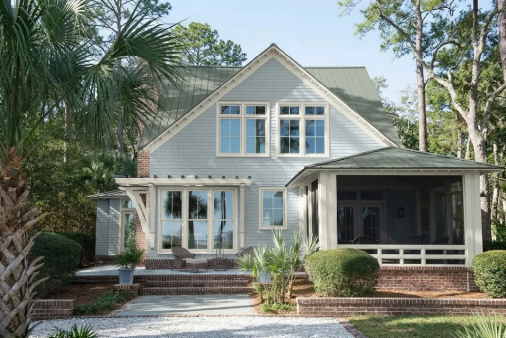 Charming cottage house exterior virtually painted in Benjamin Moore pale blue exterior paint color