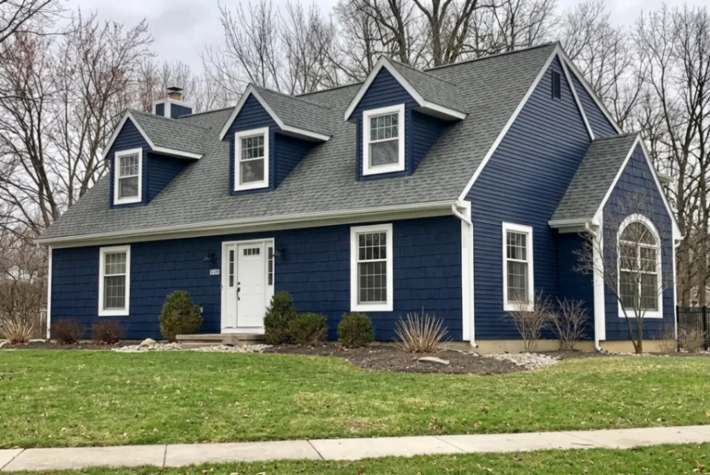 House exterior visualizer testing Sherwin-Williams Naval SW 6244 dark blue siding with crisp white trim